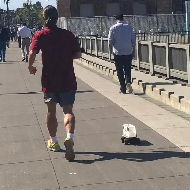 With the self-driving burrito cart out of sight you may forget you're in San Francisco. Then this guy decides to go for a run with his self-driving Bluetooth speaker